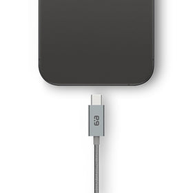 PureGear cable charging phone from laptop showing convenient long reach and flexible placement