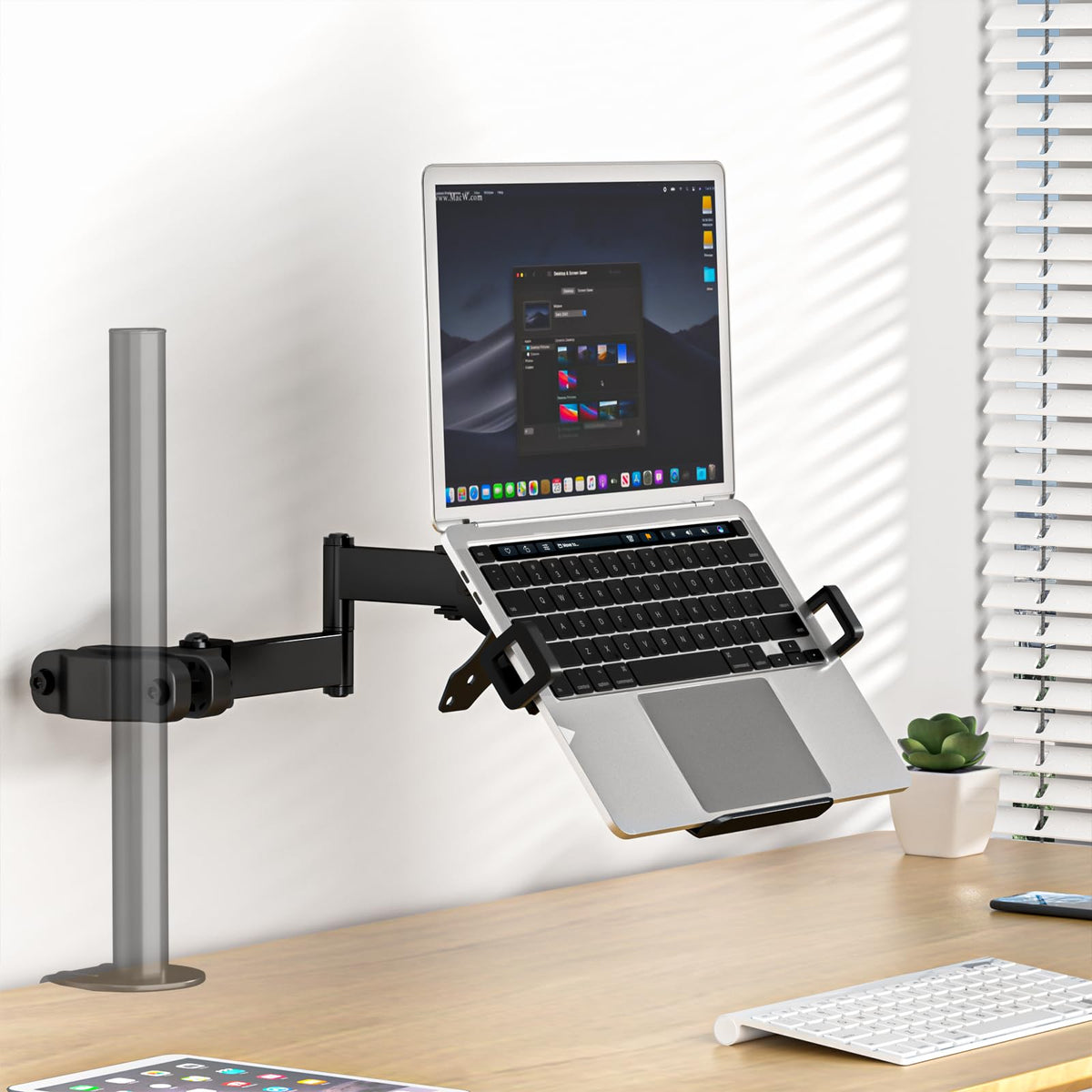PUTORSEN lifestyle shot on standing desk showing ergonomic placement
