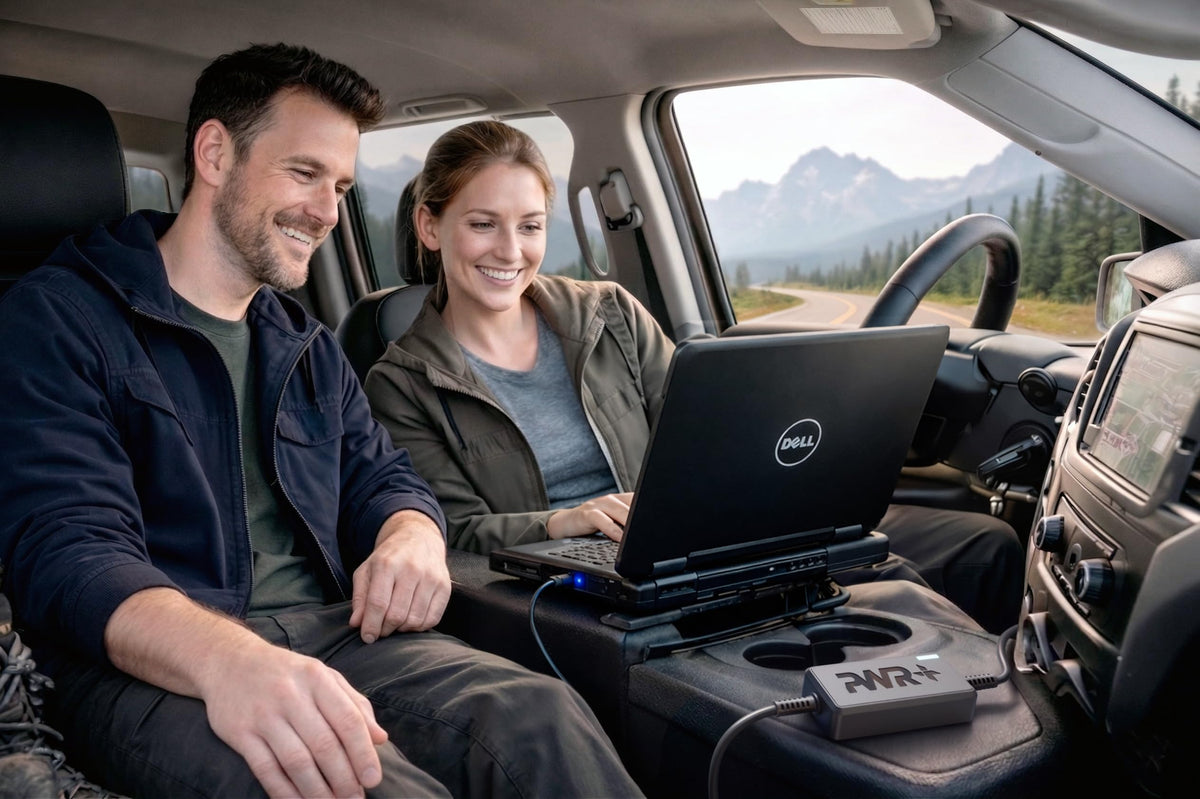 PWR+ powering a Dell Inspiron laptop demonstrating stable vehicle charging