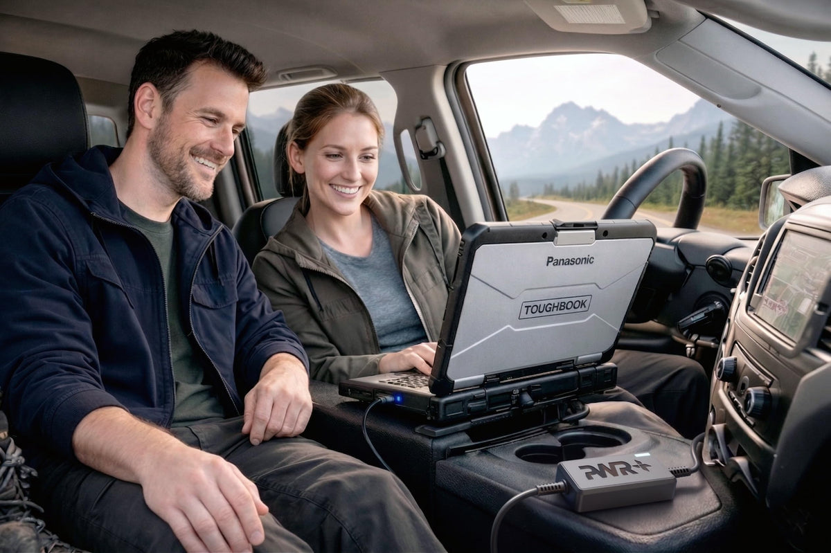 PWR+ next to a hand for scale showing compact design and portable convenience
