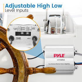 Pyle Hydra wired remote in hand for convenient volume control on deck