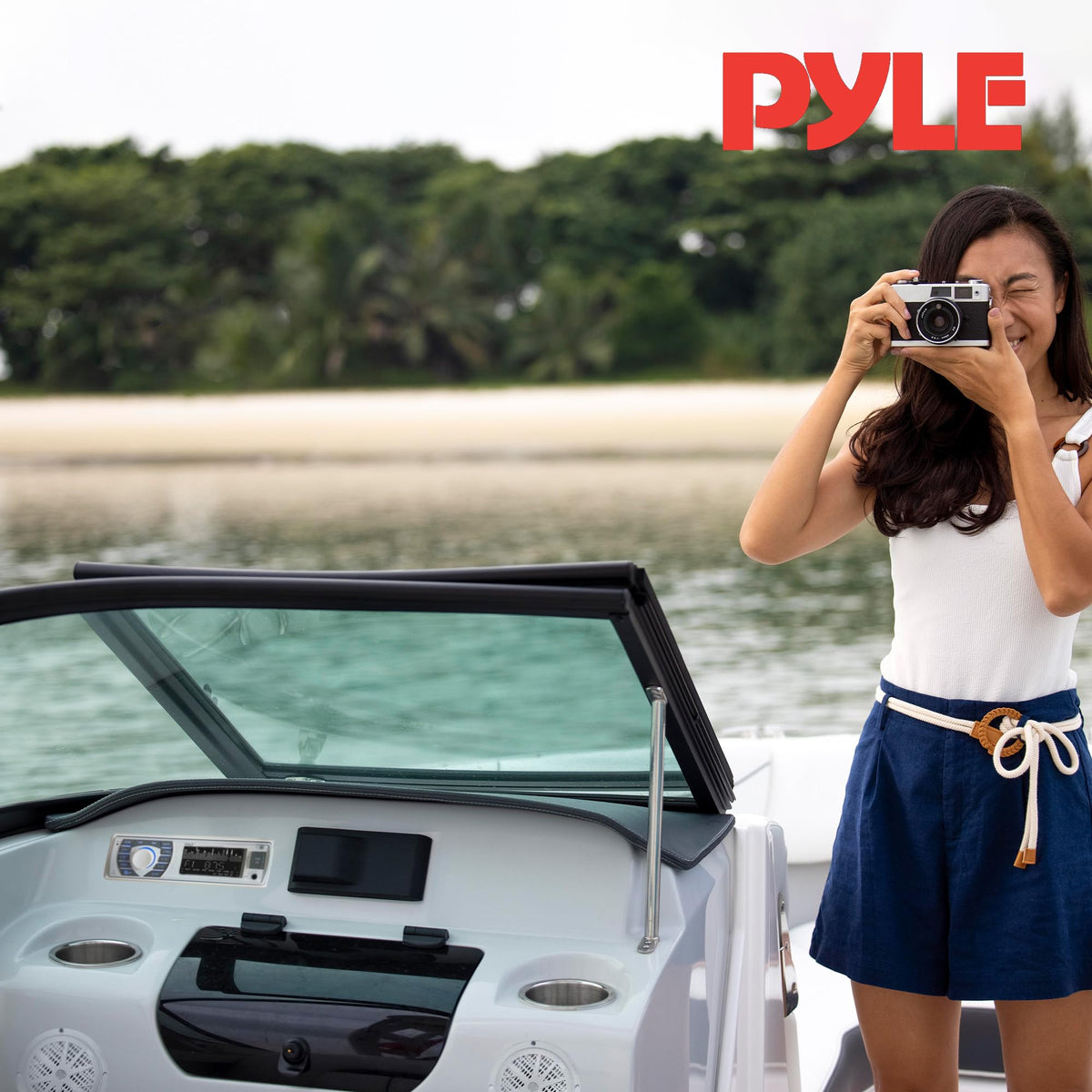 Pyle PLMRKT36WT built-in microphone for hands-free calls on the water.