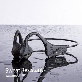 QAZITV headset with water splashes showing IP65 sweat resistance benefit