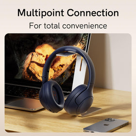 QCY H3 microphone and control ports close-up for hands-free calls and charging