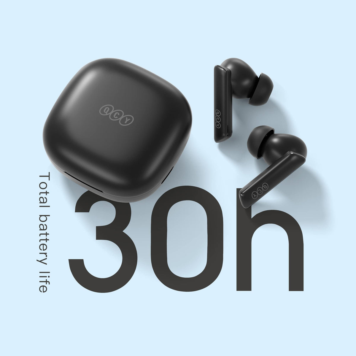 QCY HT05 next to a coin showing scale and pocketable portability benefit