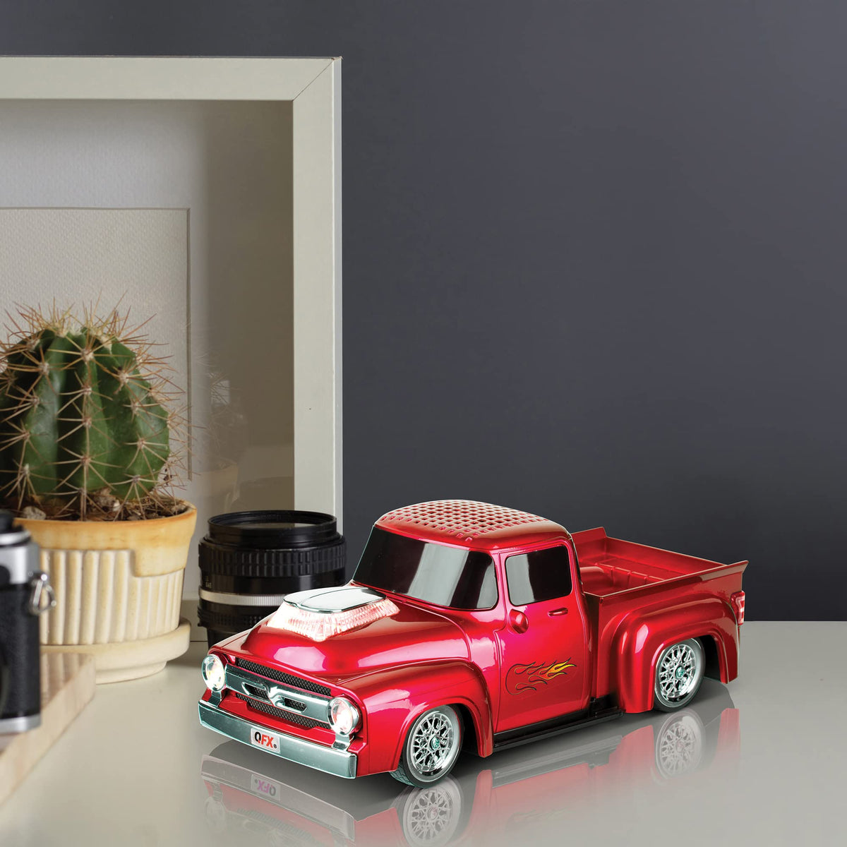 QFX BT-1956 road-trip red shell suited for travel and gatherings