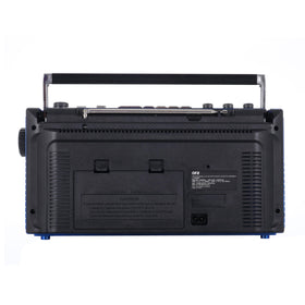 QFX boombox in backyard use showing portability and party-ready sound