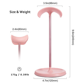 QinCoon pink headphone stand on desk, helps tidy and organize gear.