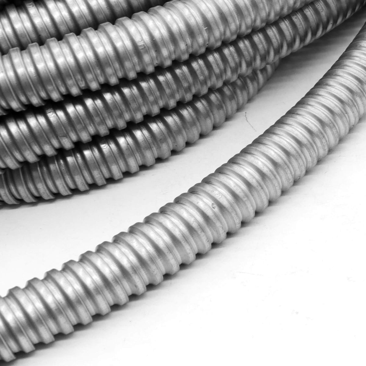 Qlvily conduit protects wires from abrasion and accidental contact in busy areas.