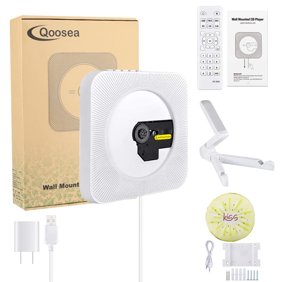 Unpacked Qoosea with adapter, remote, cables and mounting kit included