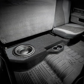 QPower underseat subwoofer charcoal carpet detail indicating durable finish