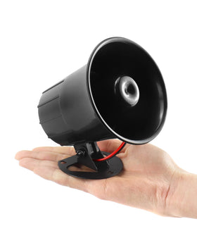 QWORK size comparison with hand illustrating compact scale and simple placement