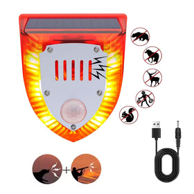 QXMH solar outdoor motion alarm front view with strobe lights to deter intruders