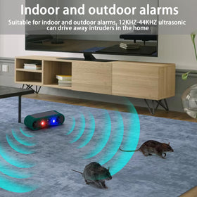 QXMH motion sensor in yard use showing versatile outdoor and indoor operation.