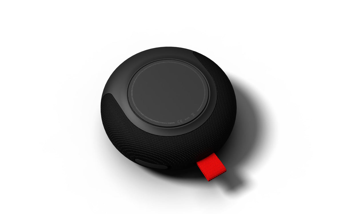 Rad Golf Sound speaker with water splashes to show IPX7 protection, weatherproof reliability