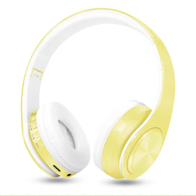 RAT TAIL front view of yellow over-ear headphones showing sleek profile and portability