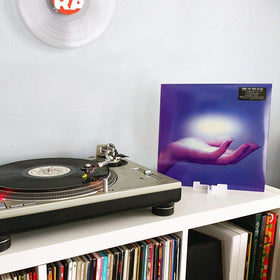 Record Props floating wall mount creates a frame-free vinyl art effect.