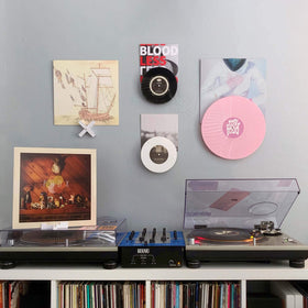 Record Props minimalist design blends with living spaces.