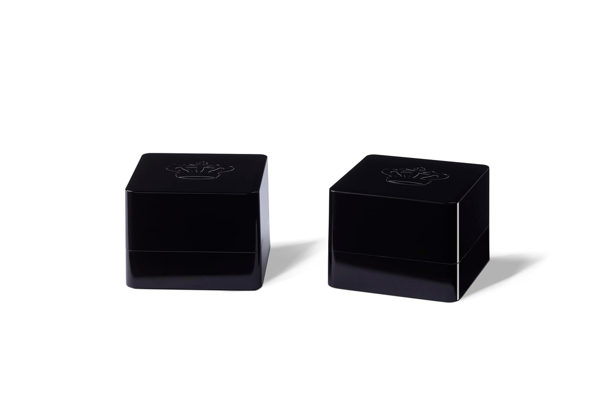REL Acoustics HT-Air MKII transmitter in a compact cube design enabling wireless subwoofer placement.