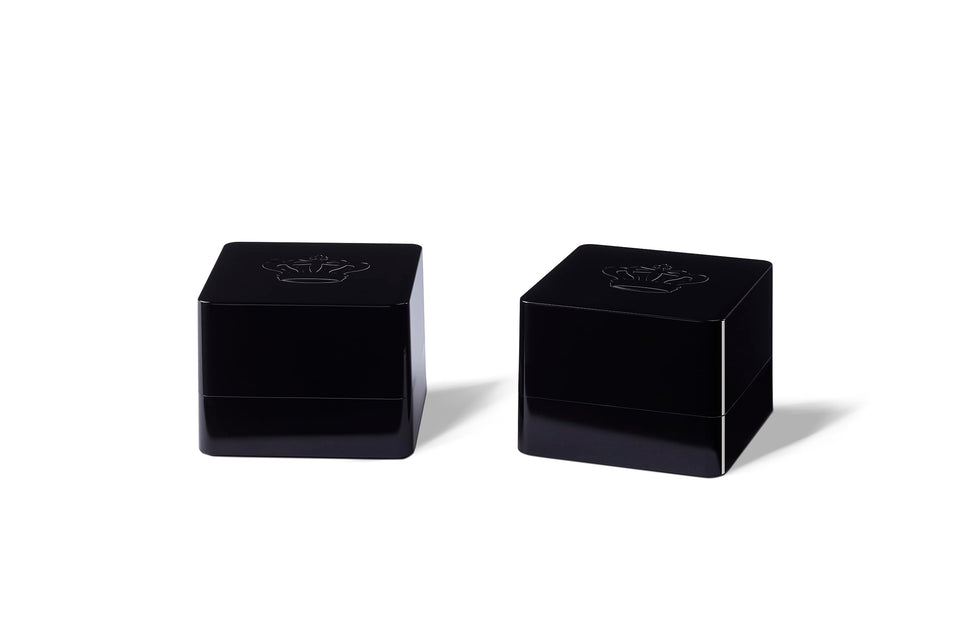 REL Acoustics HT-Air MKII transmitter in a compact cube design enabling wireless subwoofer placement.