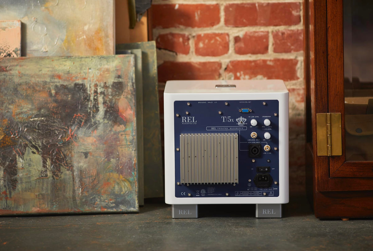 REL Acoustics T/5x compact sealed subwoofer enabling flexible music and home theater connections.