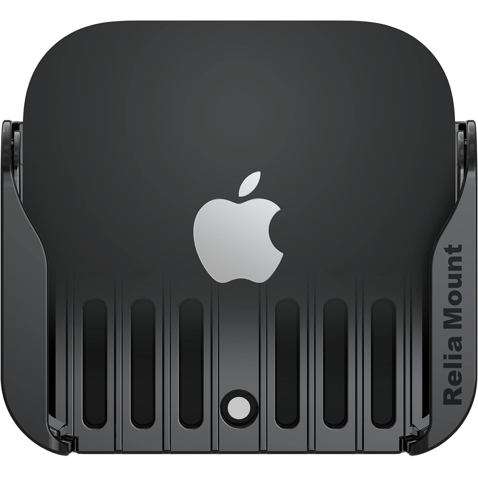 ReliaMount Apple TV mount on the back of the TV using adhesive for clutter-free setup.