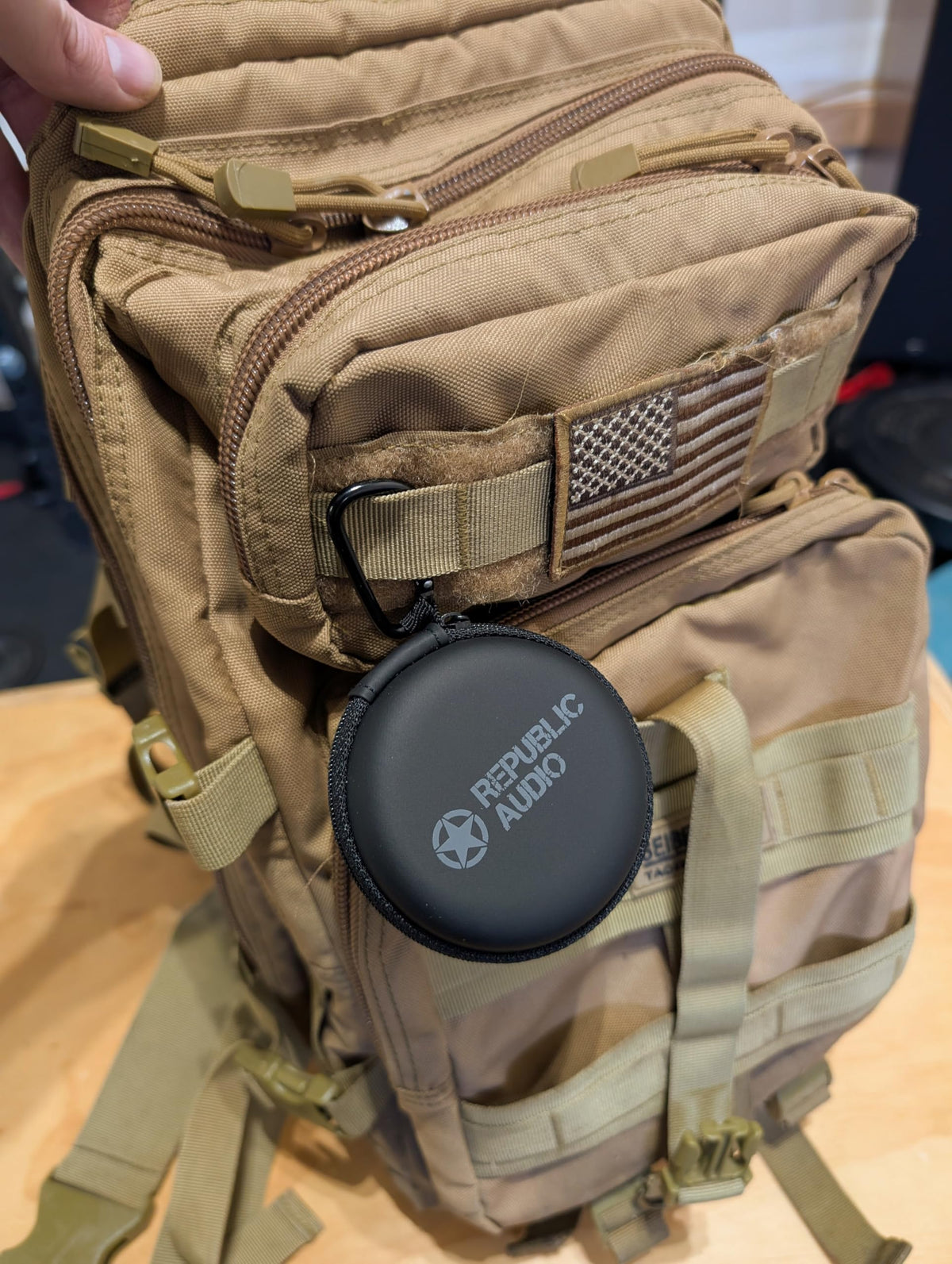 Republic Audio Echo-Alpha-1 held in hand for scale demonstrating lightweight portability