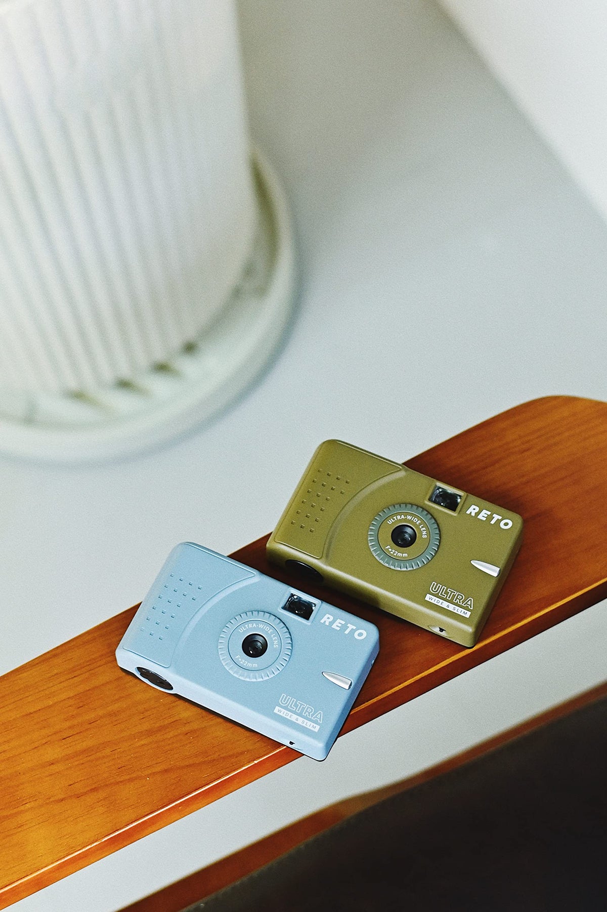 RETO pocket-size olive camera ready for everyday carry.