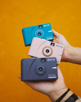 RETO Ultra Wide 35mm camera muddy yellow body stands out in casual photography.