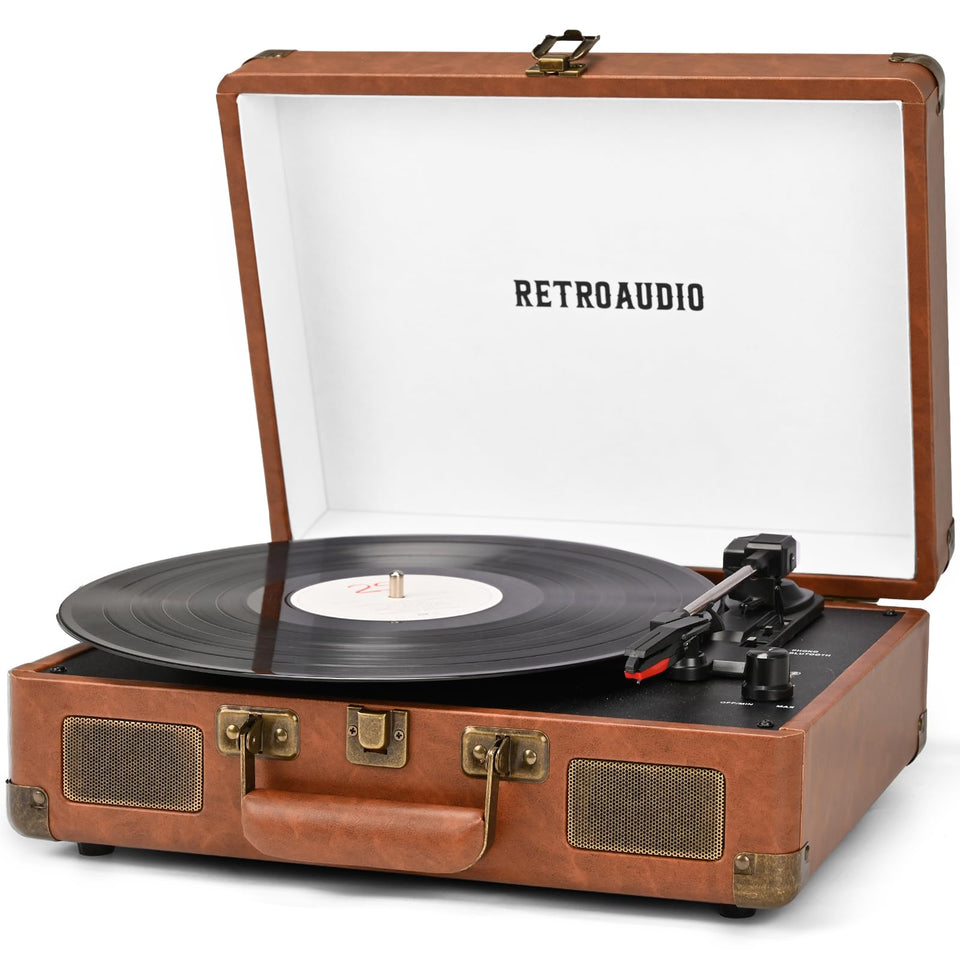 RetroAudio front view brown suitcase turntable showing built-in speakers and controls for warm playback