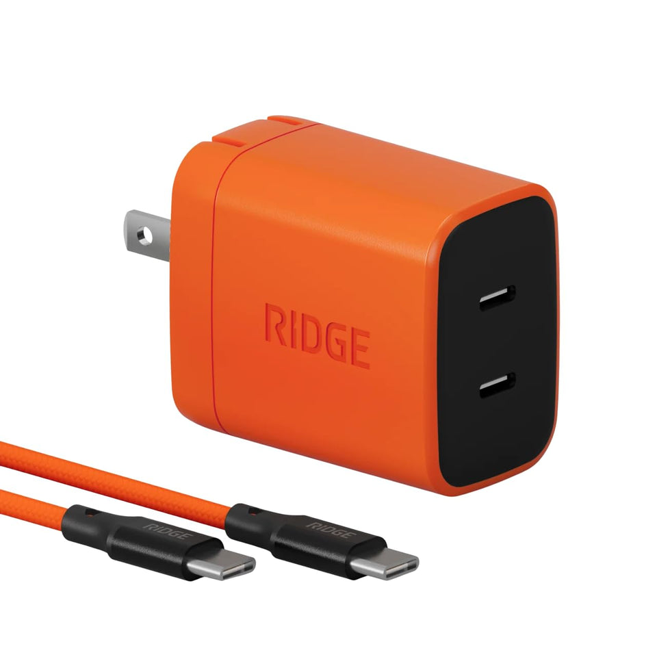 The Ridge adapter front view showing compact design and Basecamp Orange, ideal for travel