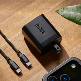 Ridge packed in a travel bag with laptop, space-saving portability benefit