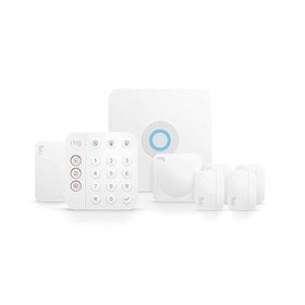 Ring Alarm base station on table provides reliable home security connectivity.