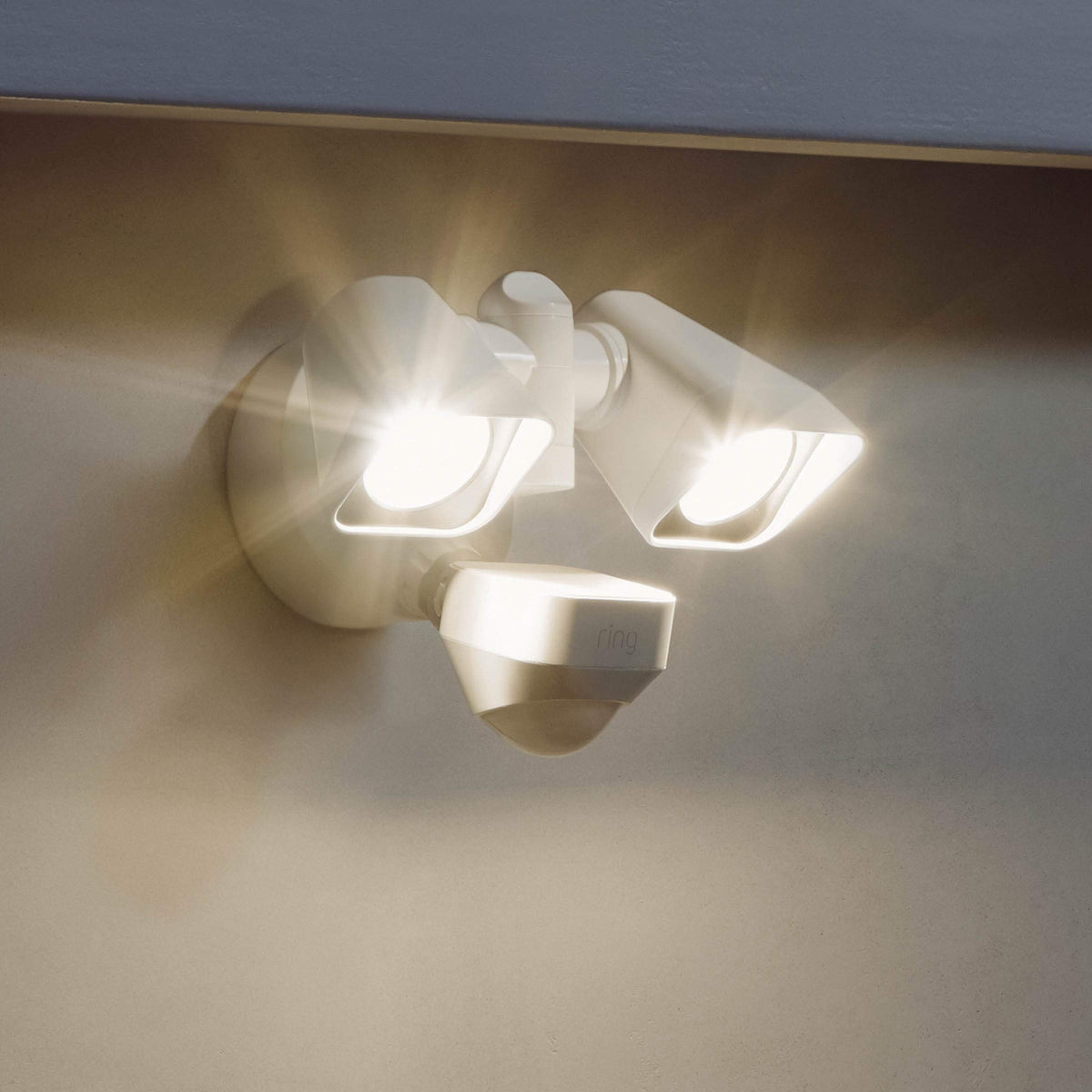 Ring Floodlight Wired detects motion to activate outdoor lighting.
