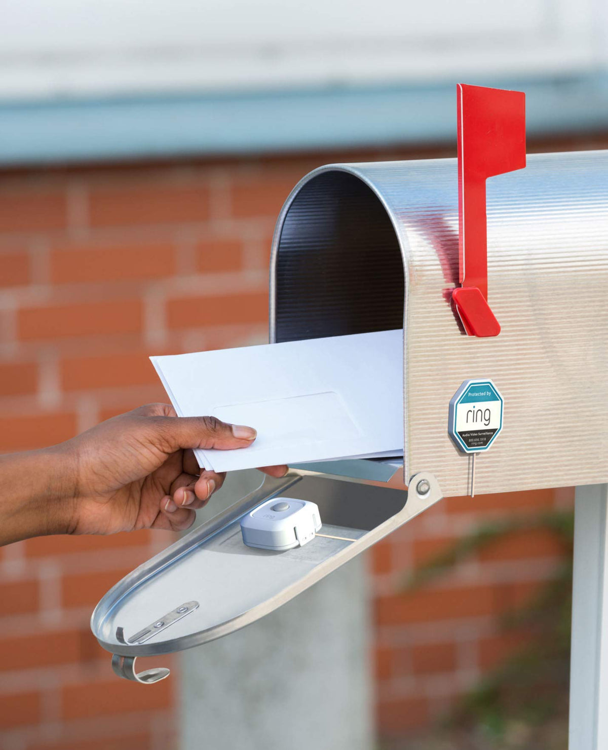 Ring Mailbox Sensor installed inside a mailbox detecting mail and improving awareness