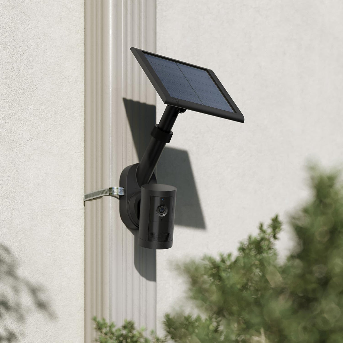 Ring mount attached to gutter downspout illustrating flexible placement on narrow surfaces