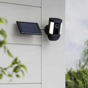 Ring small solar panel held in hand for size comparison benefit: compact footprint fits tight spaces