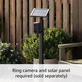 Ring stake mount next to a hand for scale showing compact, portable benefit