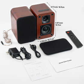 RIOWOIS speaker beside laptop for scale and desktop audio setup