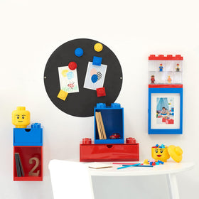 Room Copenhagen LEGO storage head stack demo shows vertical storage saving floor space
