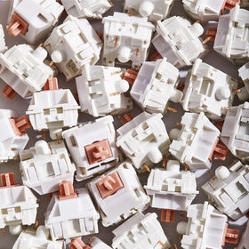 ROZELLA HOME hands typing on keyboard with these switches showing improved tactile feedback