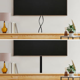 RUBBER BOND installed behind a TV for cleaner entertainment setup