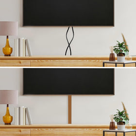 RUBBER BOND installed behind wall-mounted TV creating a clean, organized setup