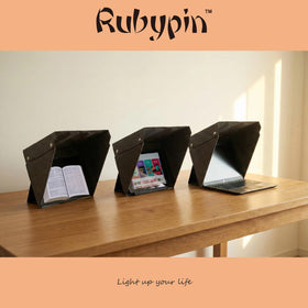 Rubypin beside ruler showing size fit for 12–16" laptops and easy storage