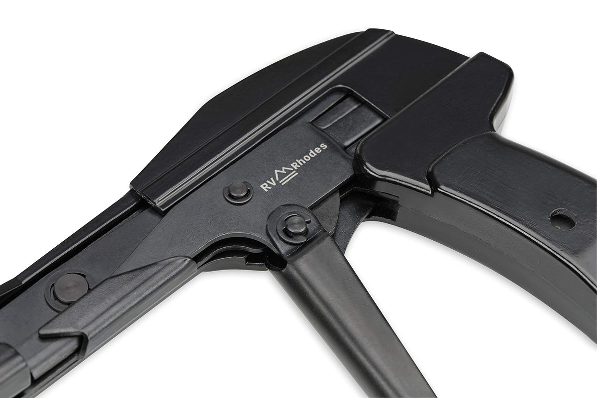 RV Rhodes zip tie gun next to pliers to show compact scale and jobsite portability
