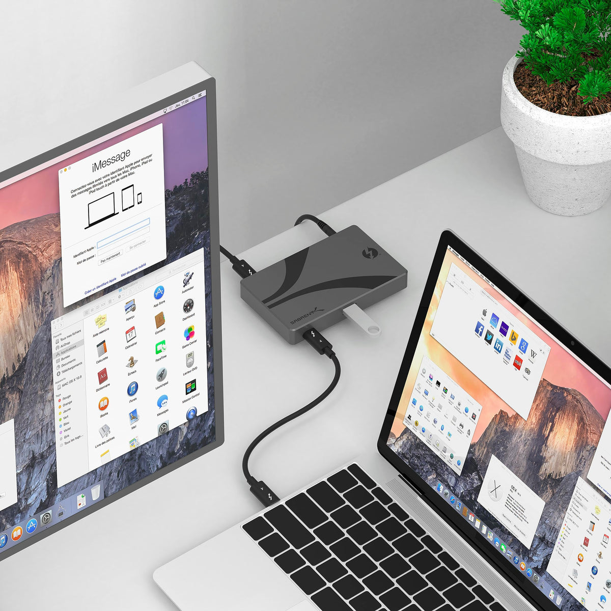 SABRENT Thunderbolt 4 Hub on a desk with macOS and Windows devices nearby, showing cross-platform support.