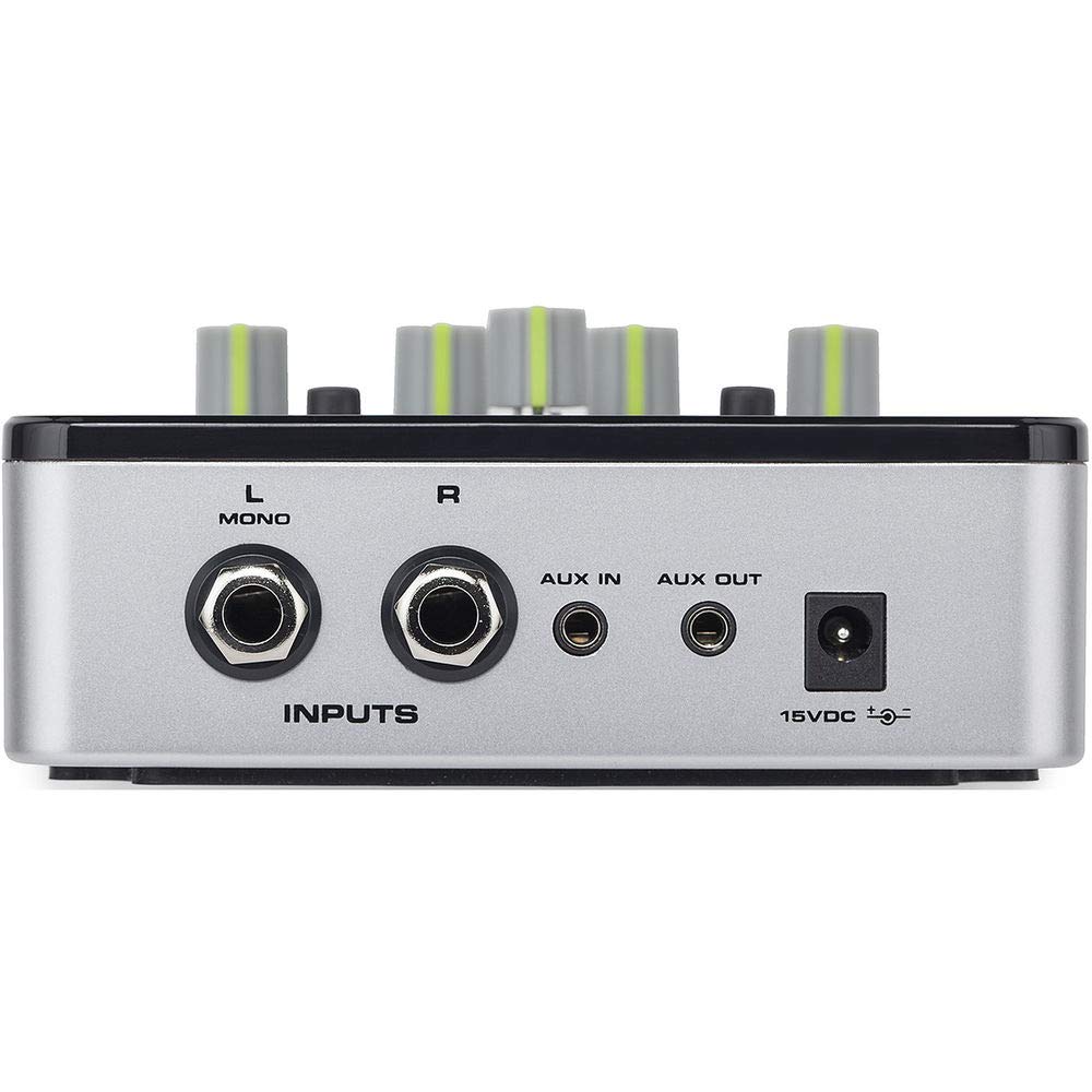 Samson QH4 next to headphones to show compact size and portable convenience for sessions