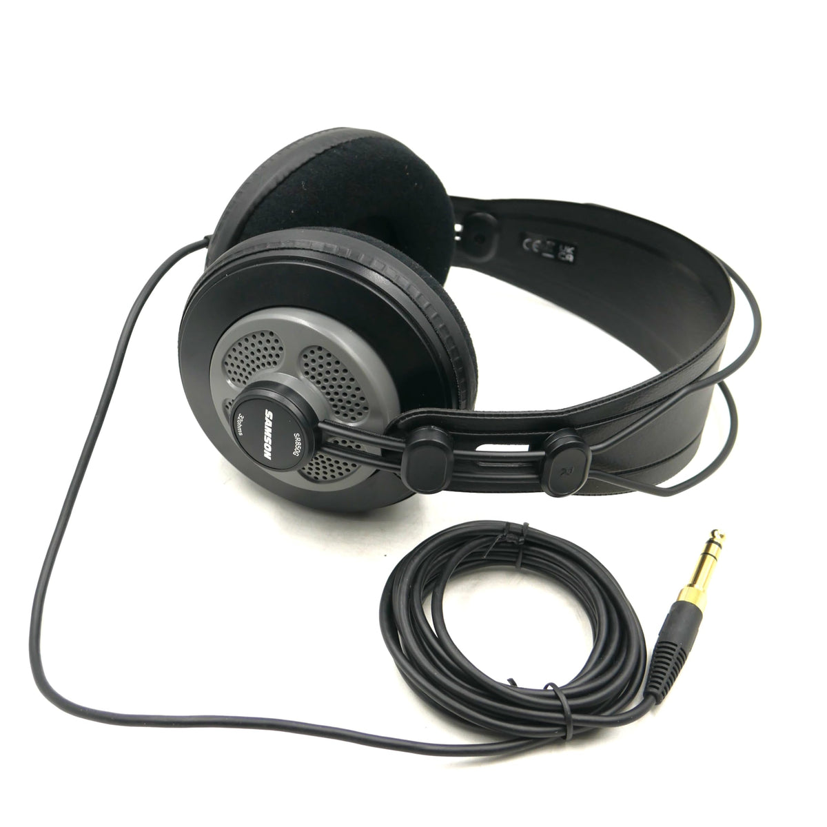 SAMSON SR850G worn in studio on a mixer showing real-world monitoring and mixing benefit
