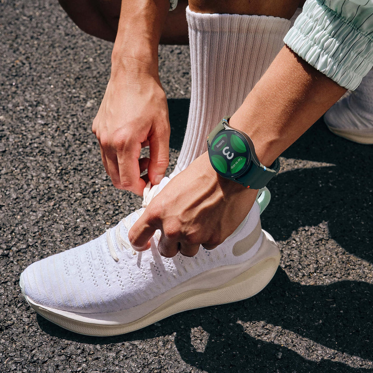 Samsung Galaxy Watch7 Green music streaming to Buds for workouts.