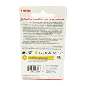 Sandisk 64GB microSD card being inserted into a Fire Tablet for extra storage